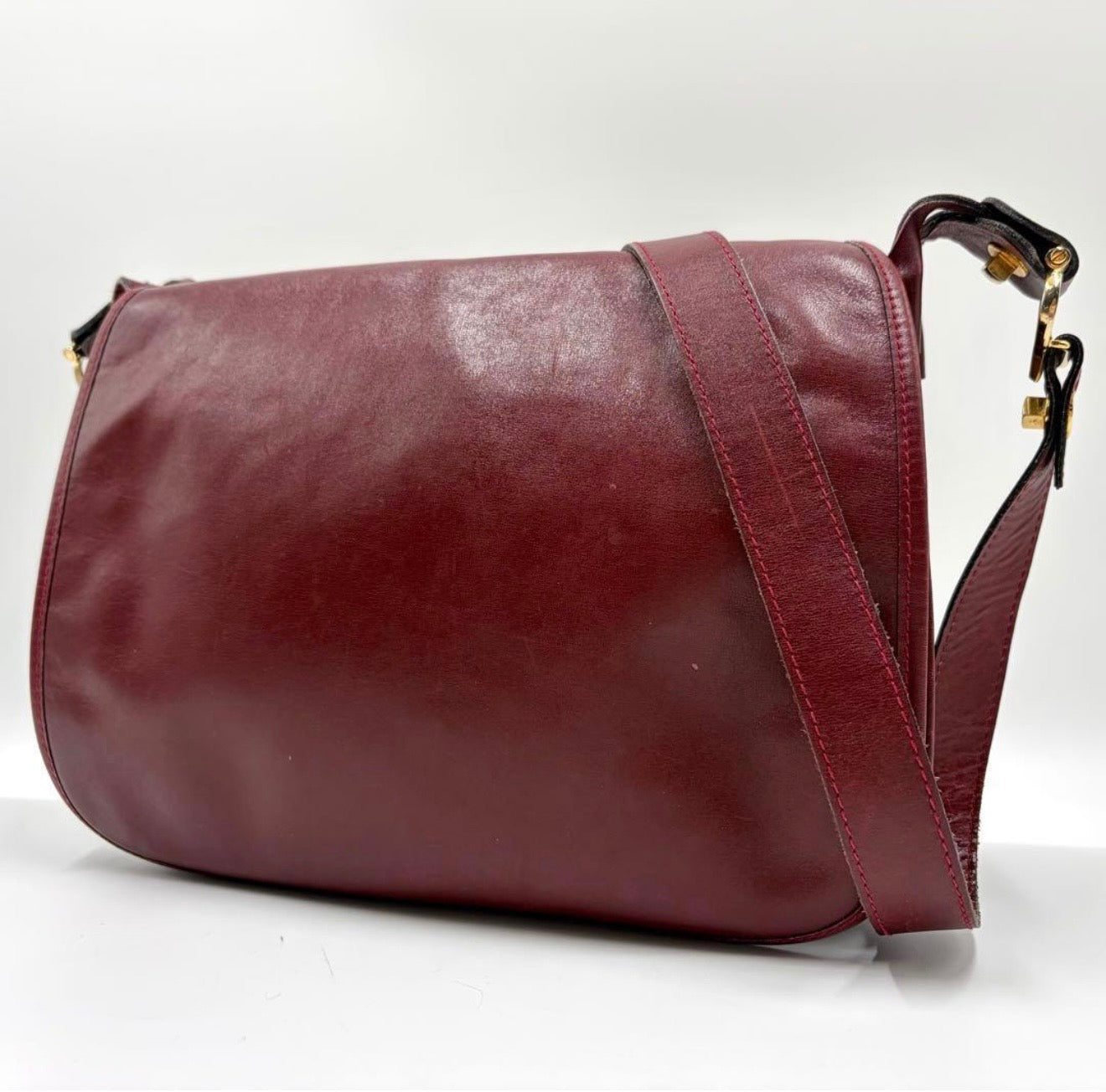 : Vintage Must de Cartier Burgundy Leather Saddle Flap Bag