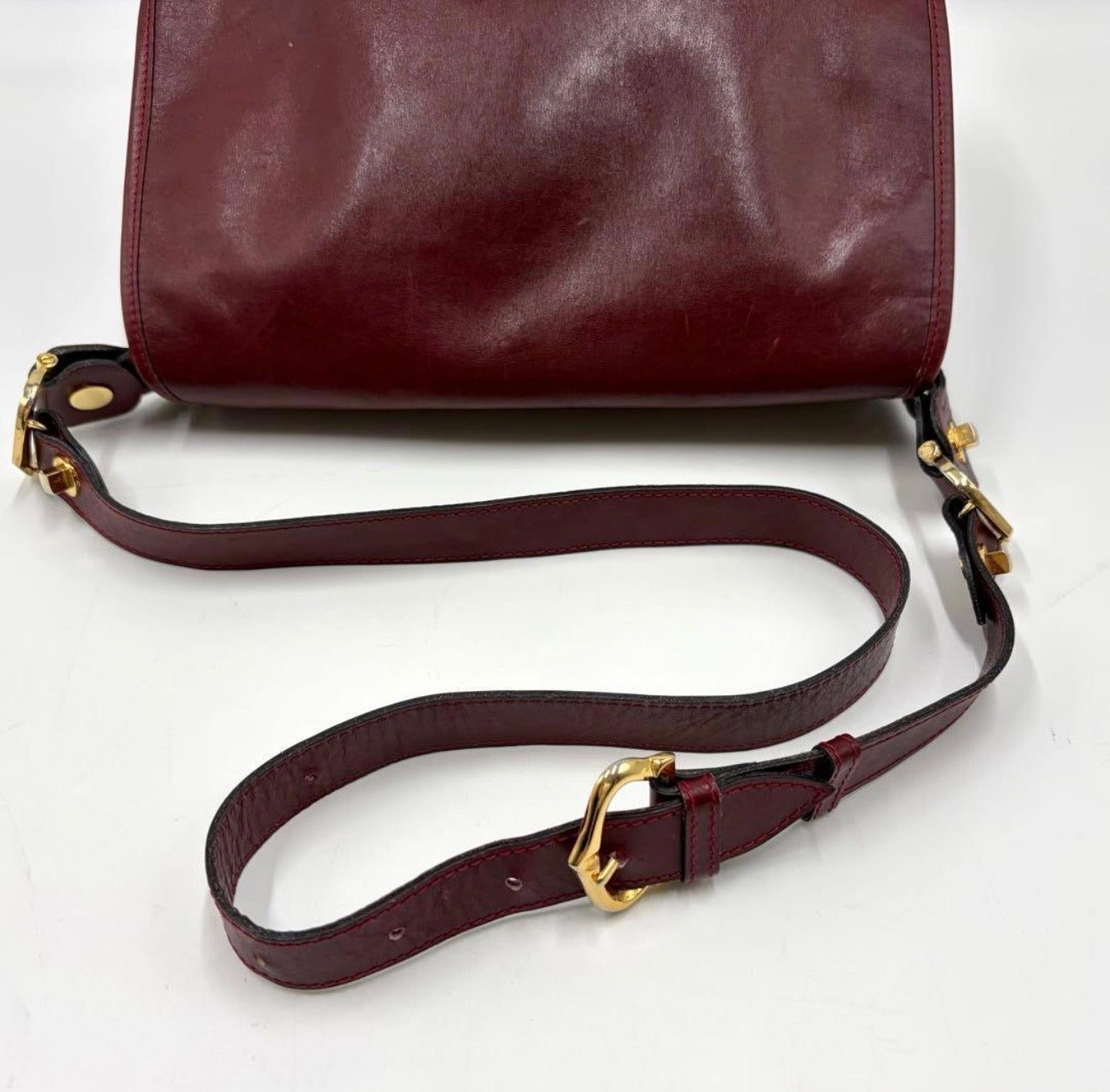 : Vintage Must de Cartier Burgundy Leather Saddle Flap Bag